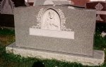 #133 - 4-0 Barre Granite - a 2" relief sculpture of Sacred Heart